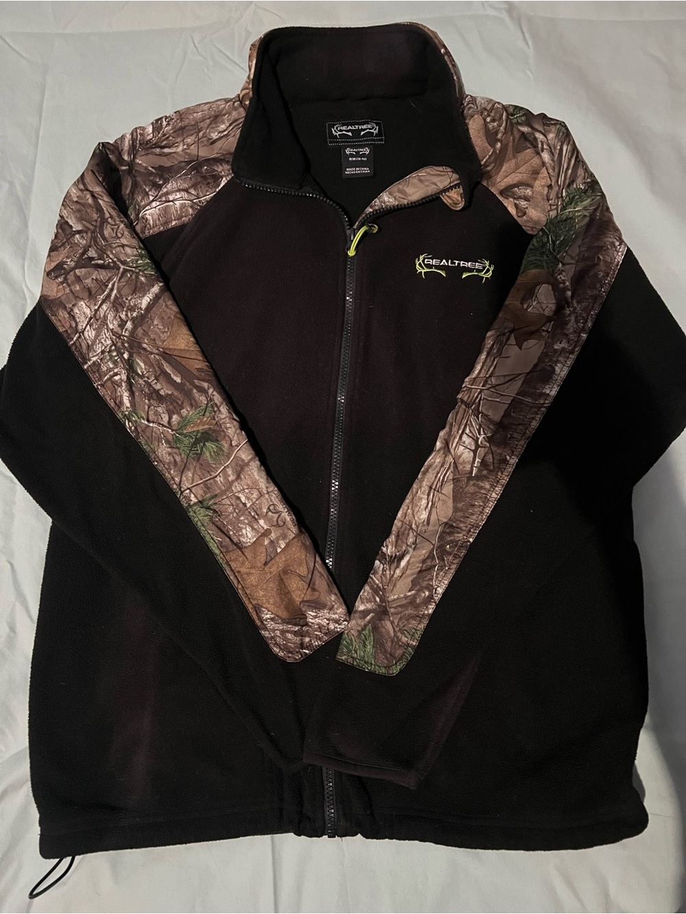 Realtree Men’s Black Fleece Jacket with Brown Camo Sleeves size medium